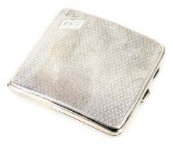 A George V silver cigarette case, with engine engraved decoration bearing the initials OCJ, Birmingh