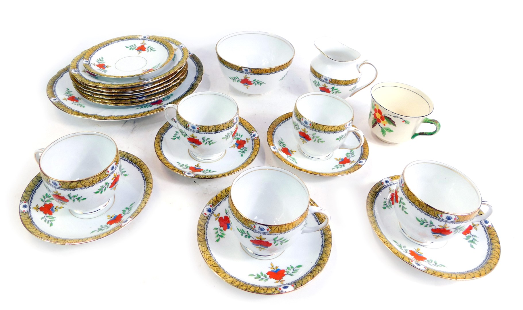 A Melba bone china part tea service, each piece decorated with flowers against a white ground, with