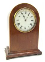 An early 20thC mahogany and inlaid mantel clock, of arched form with white enamel dial bearing Roman