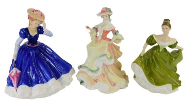Three Royal Doulton porcelain figures, modelled as Figure of The Year Mary HN33775, Flowers Of Love