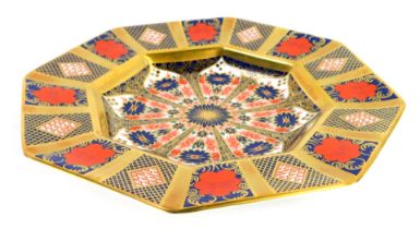 A Royal Crown Derby Old Imari porcelain plate, of octagonal form, gold ground, pattern 1128, boxed,