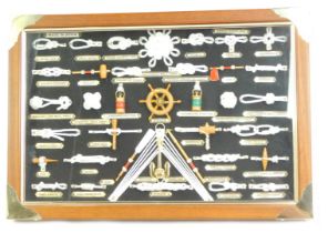 Maritime interest. A framed display depicting various knots, components of a ship, etc., 34cm x 48cm