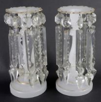 A pair of late 19thC Victorian milk glass lustres, each on a white ground with gilded decoration and