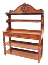 A 19thC Continental mahogany buffet, the top with a raised scroll carved back above two shelves, the