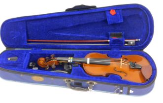 A Stentor Student I violin, 45cm long, with bow, and canvas carrying case.