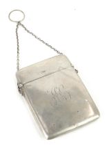 A George V silver card case, engraved with the initials H C, with suspension chain, maker T B, Birmi