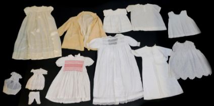 A group of early 20thC and later night dresses, aprons, etc., some with broderie anglaise embellishm