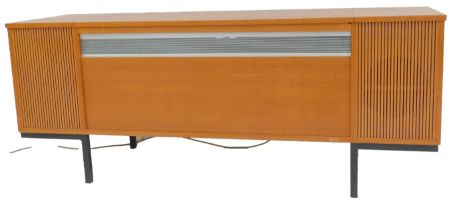 A teak cased radiogram, containing a Decca SRJ899 turntable, 56cm high, 140cm wide, 47cm deep.