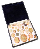 A cased set of cameos and intaglios, each of oval design, depicting figures in flowing dress, fitted