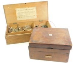 A Jaques's table billiards set, contained in a pine case, 47cm wide, together with a mahogany workbo