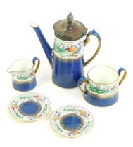 A Wedgwood Peacock pattern part coffee service, decorated with a band of peacocks above a powder blu