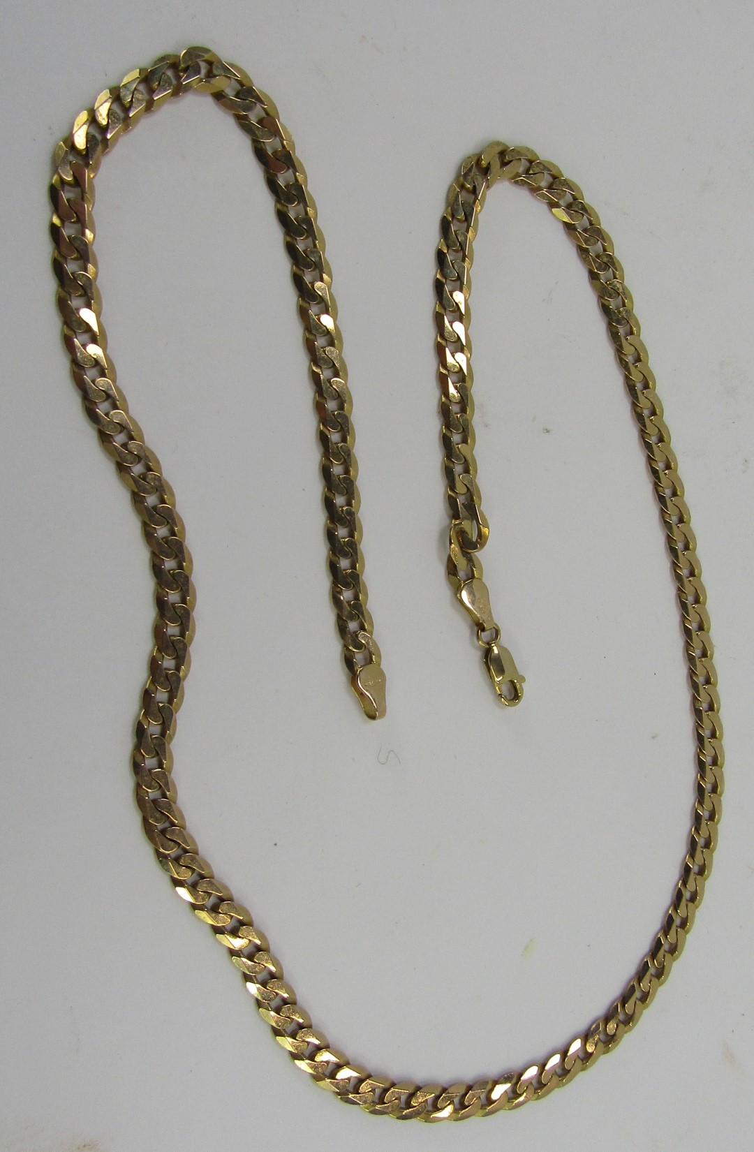 A flattened curb link neck chain, yellow metal, stamped 375, 49cm long, 21g. - Image 2 of 3