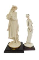 A Florence Guiseppe Armani resin figure, modelled as Young Lady with Yorkshire Terrier, on square wo