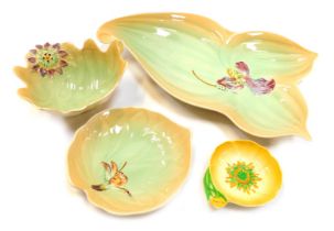 A group of Shorter leaf moulded pottery, comprising an hors d'oeuvres dish, 37cm wide, a plate, 17cm