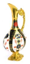 A Royal Crown Derby Old Imari porcelain ewer, pattern 1128, red printed marks, 26cm high, boxed.