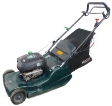 A Briggs and Stratton Hayter Harrier 48 petrol mower, serial number 314001309.