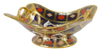 A Royal Crown Derby Old Imari porcelain twin handled basket, gold ground, pattern 1128, printed mark