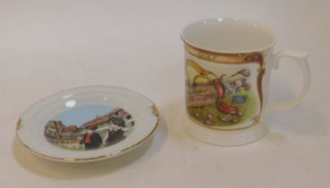 A Queen's Golf pattern mug and a porcelain ashtray. (2)