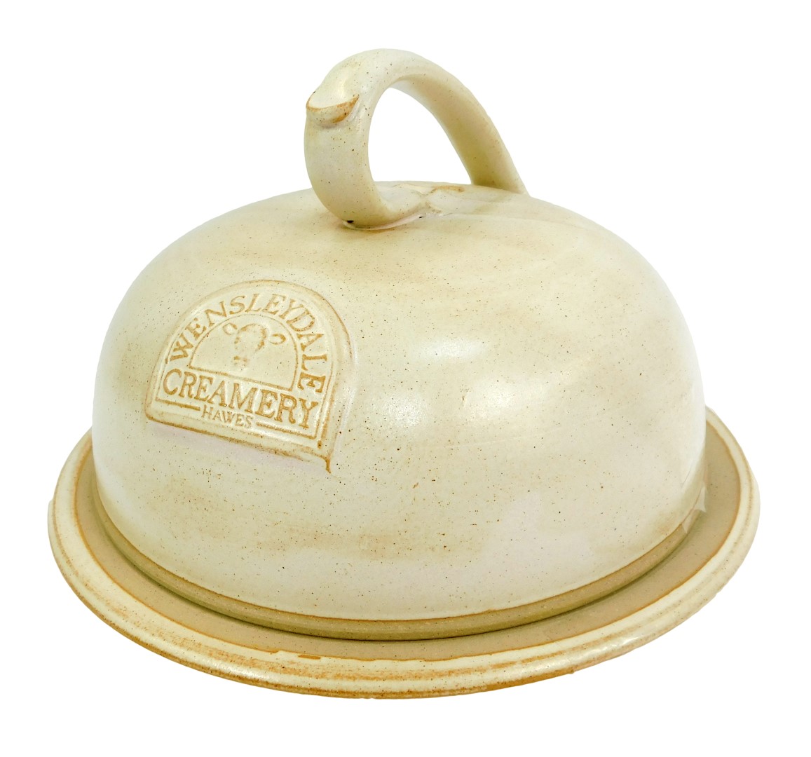 A Wensleydale Creamery Hawes stoneware cheese cloche and base, with impressed plaque to the front, a