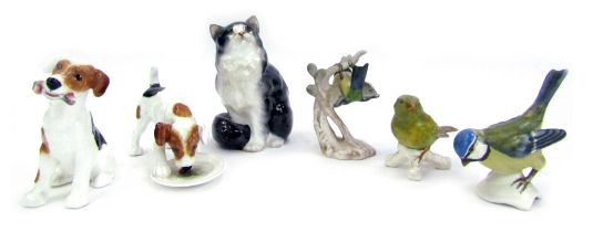 A Royal Doulton porcelain model of a black and white cat, printed marks, 13cm high, together with tw
