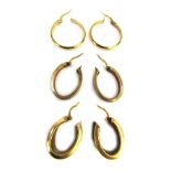 Three pairs of hoop earrings, each yellow metal, stamped 375, one with Greek key style design, the o