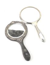 Two silver back hand mirrors, comprising a 1920s silver plated hand mirror, and a silver hand mirror