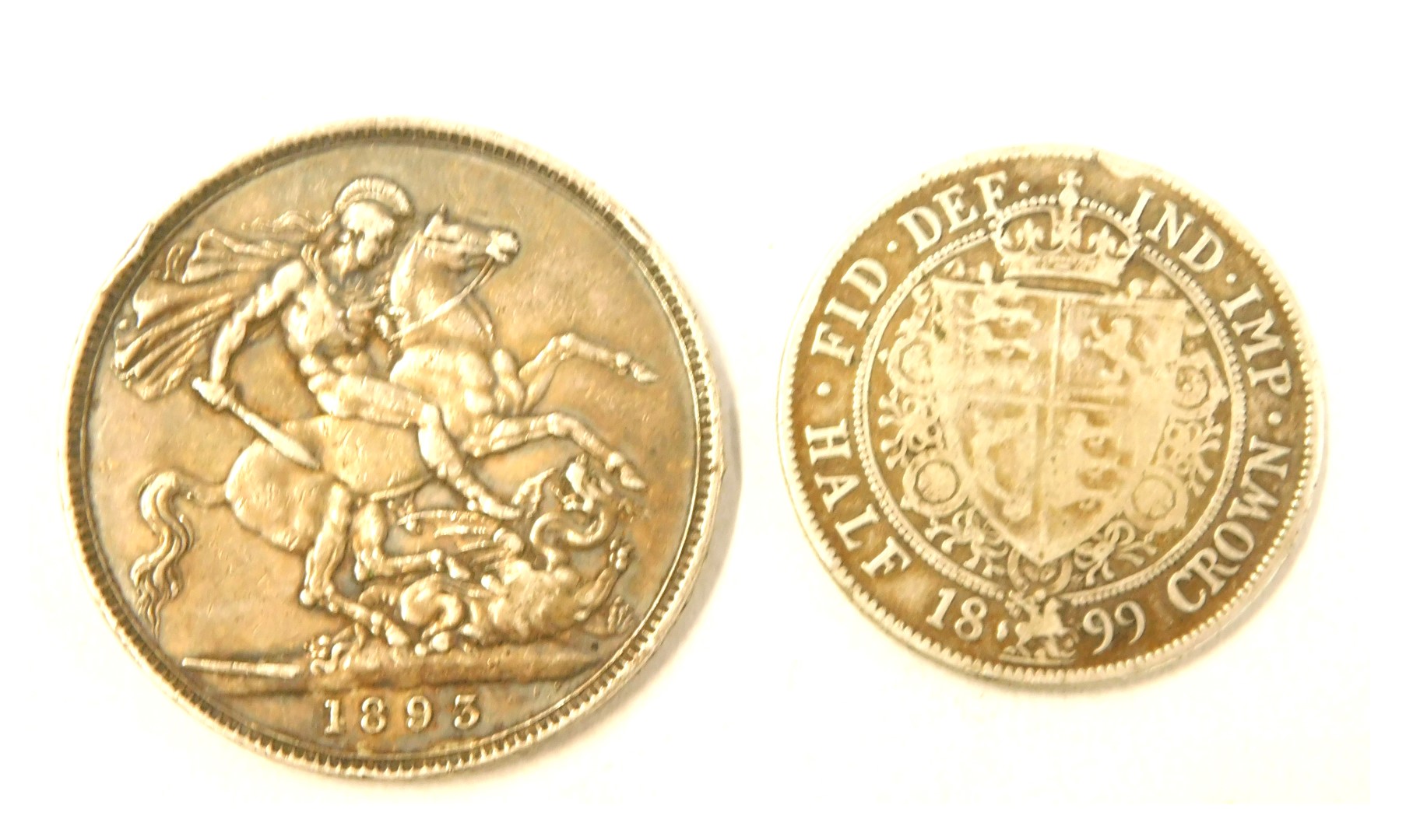 A Victorian 1893 crown and an 1899 Victorian half crown. (2)