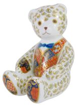 A Royal Crown Derby porcelain paperweight, modelled as a seated Teddy bear, gold stopper and red pri