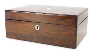 A Victorian rosewood sewing box, the hinged lid enclosing various recesses with pink satin interior,