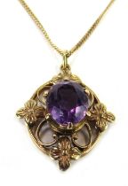 An Elizabeth II 9ct gold pendant and chain, with an oval cut amethyst, in a crown shaped claw settin