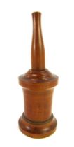 A 19thC turned treen glove duster, the top with four pierced sections on a turned base, 14cm high.