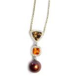 A cultured pearl necklace, of modern design, with a brilliant cut deep brown/purple topaz, and a squ