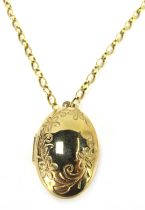 A locket pendant and chain, the oval locket with floral border, 3.5cm x 2cm, on thin curb link