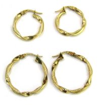 Two pairs of hoop earrings, each yellow metal, stamped 375, comprising a pair of small twist design