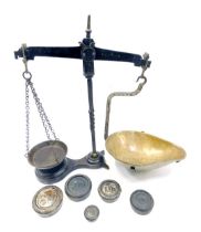 A set of 19thC tabletop balance scales, with an assortment of weights, 44cm high, 54cm wide.