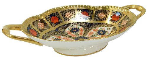 A Royal Crown Derby Old Imari porcelain twin handled oval pedestal sweetmeat dish, gold ground,
