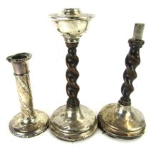 A pair of Edward VII silver and oak twist column candlesticks, 22cm high, and a white metal ribbed c