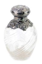 A George V silver mounted cut glass scent bottle, with silver mount and hinged lid, the bottle with