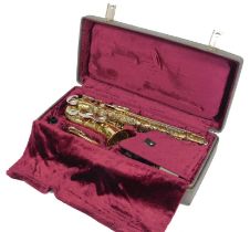 A Corton E Flat Alto saxophone, in fitted case with mouthpiece and carry strap.