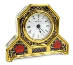 A Royal Crown Derby porcelain desk clock, decorated in the Old Imari pattern, with circular Roman nu