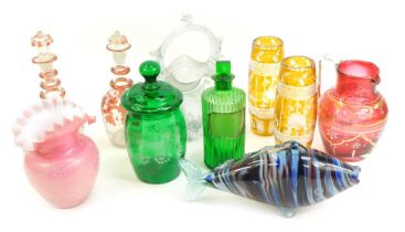 A group of Victorian and later coloured glassware, to include a green glass chemists bottle and stop