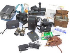 Various camera equipment, comprising a Sony Handicam Video 8, a Canon Ixus Z70, Philips radio casset