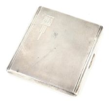 A George VI silver cigarette case, of rectangular form with engine turned decoration bearing the ini