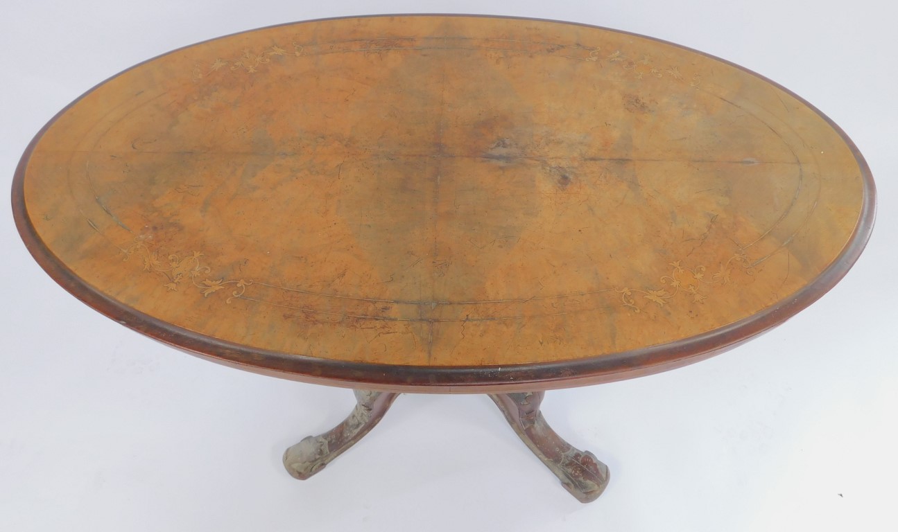 A Victorian walnut and inlaid occasional table, the oval top with floral scroll and line inlay decor - Image 2 of 3