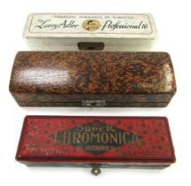 A Larry Adler Professional 16 chromatic harmonica by M Hohner, boxed, together with a Super chromoni