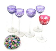 A group of 20thC glass ware, comprising a set of four amethyst flashed liqueur glasses, raised on fa