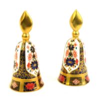 Two Royal Crown Derby Old Imari porcelain candle snuffers, gold ground, pattern 1128, red printed