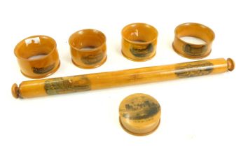 A group of Mauchline ware, to include napkin rings for Hastings from the Sea, Anne Hathaway's Cottag