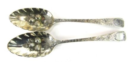 A pair of George III silver berry spoons, with engraved foliate decoration, fruit embossed bowls, Pe