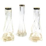 Three Victorian cut glass posy vases, each with silvered collar, 20cm high.